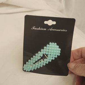 3 inch snap barrette covered with pale aqua pearls